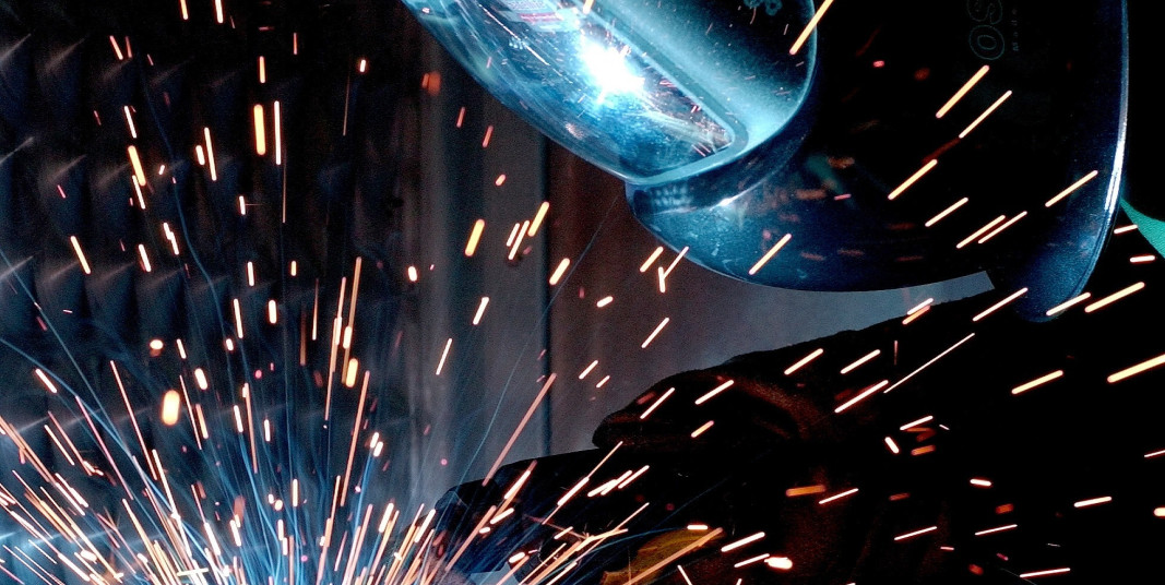 Person sparks welder