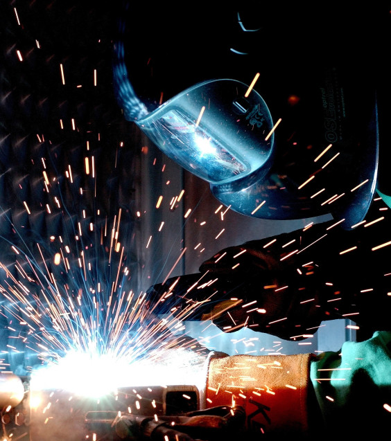 Person sparks welder