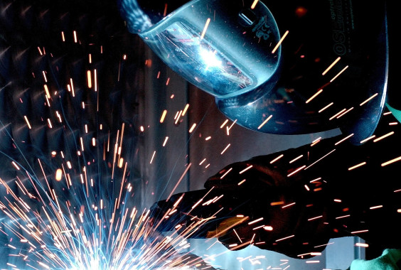 Person sparks welder